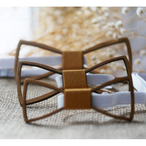 Mini pajarita de madera con arasbescos huecos 